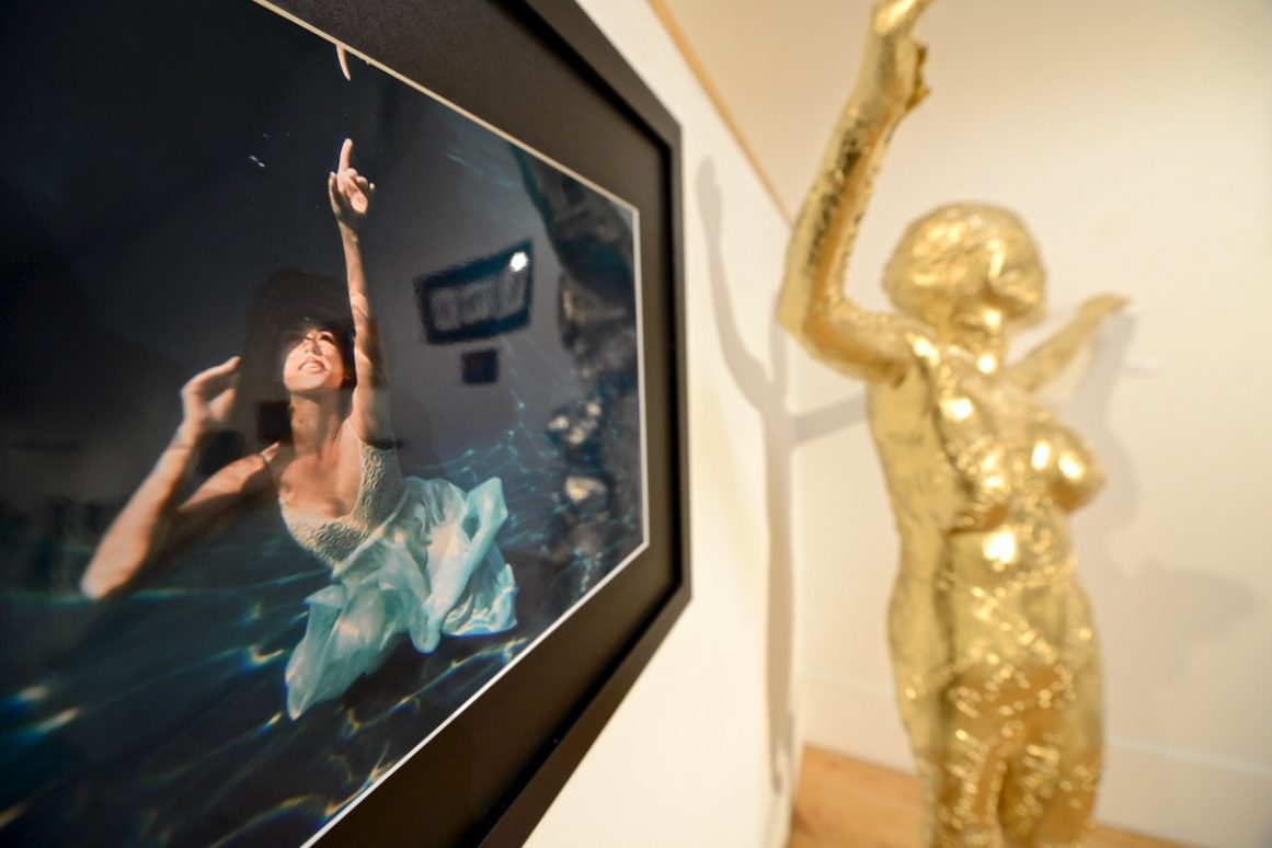 My Reflection, by Trinidad Gallegos, digital photography. At right, Gallegos_ mixed media art Build Her Up A Doyenne
