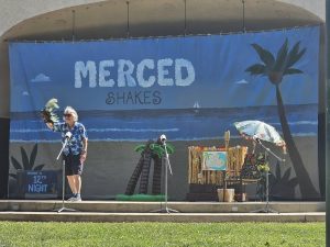Heike Hambley, artistic director of Merced Shakespearefest, speaking to a crowd of attendees at their latest production.